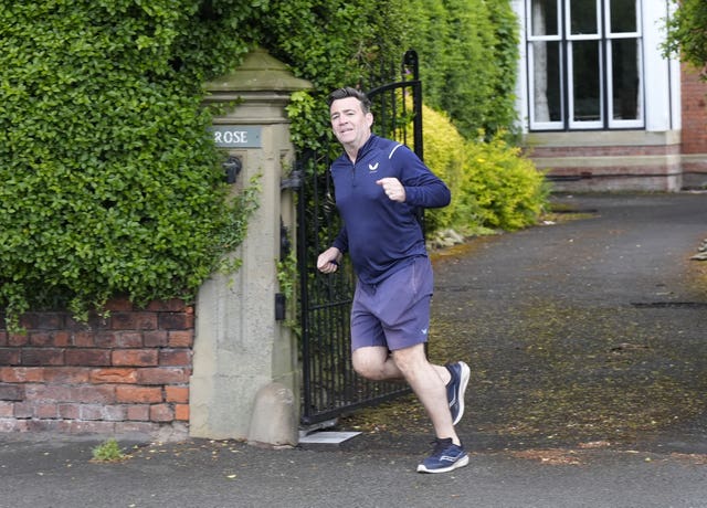 Mayor of Greater Manchester Andy Burnham outside his house in Warrington