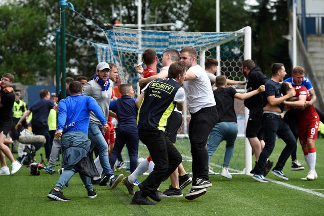 Fans were on the pitch 