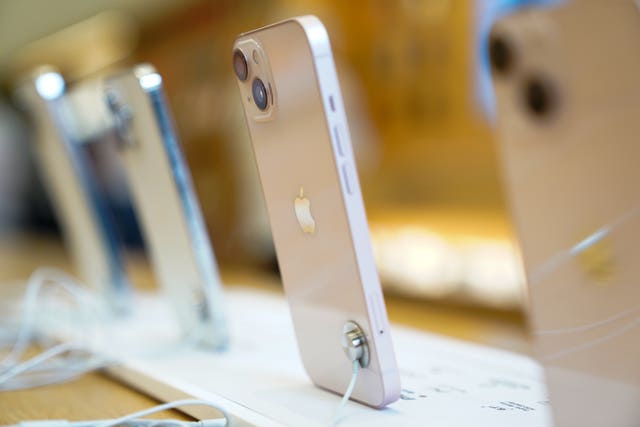 A display of Apple iPhones in a shop 