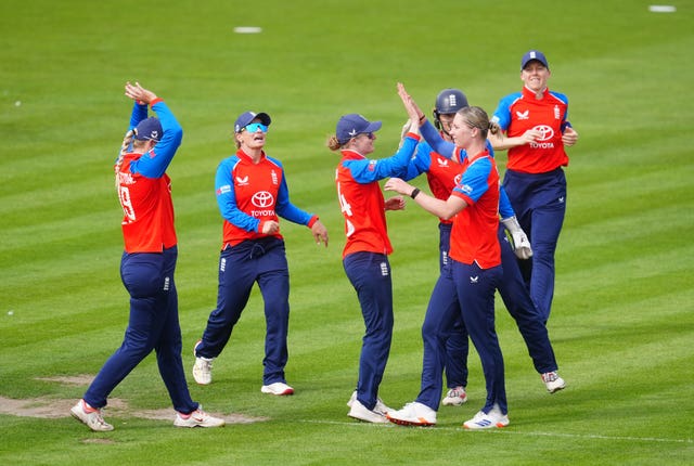 Freya Kemp celebrates taking the wicket of Jemimah Rodrigues
