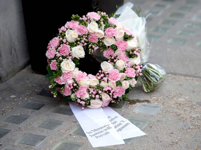 A floral tribute left by Mr Magnussen in Great Portland Street (David Mirzoeff/PA)