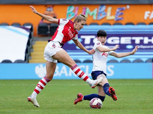 Ashleigh Neville in North London derby action against Arsenal’s Vivianne Miedema  