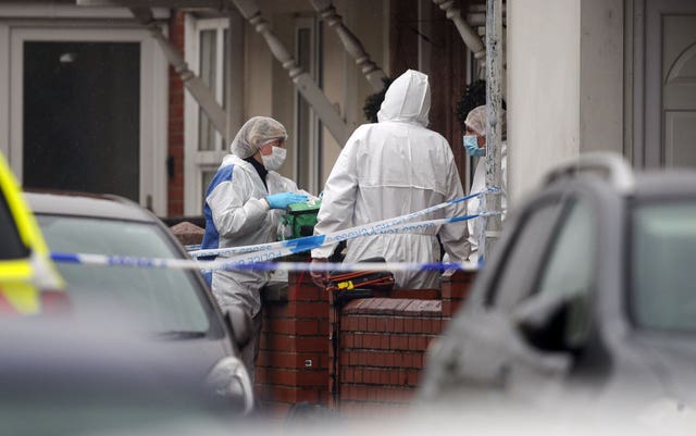 Forensic officers at the scene of the incident 