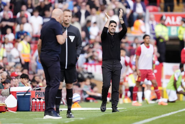 Arteta (right) gestures on the touchline