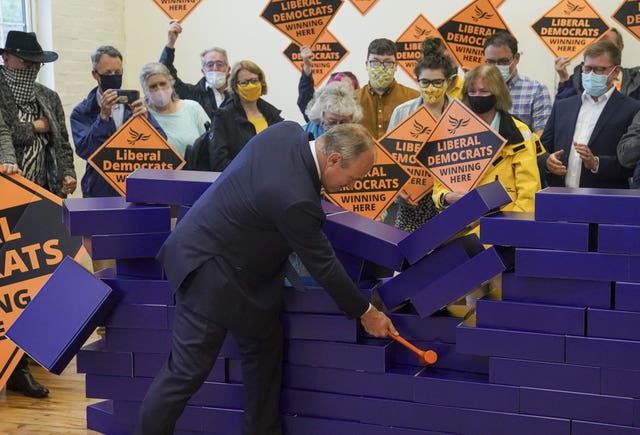 Ed Davey celebrates the Lib Dems' victory in the Chesham & Amersham by-election with a stunt at Chesham Youth Centre, Buckinghamshire