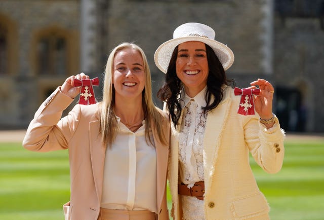 Mead (left) and Lucy Bronze after being made MBEs by the Prince of Wales at Windsor Castle (Andrew Matthews/PA)