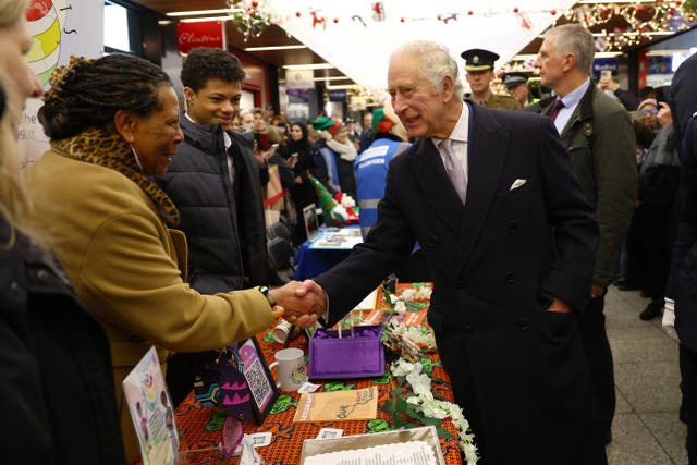 The King during his visit to Ealing Broadway shopping centre and Christmas market 