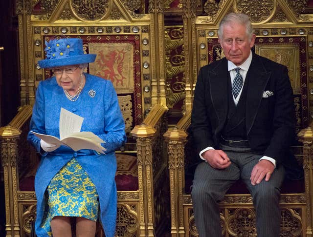The Queen and the Prince of Wales in the House of Lords for the State Opening of Parliament (Arthur Edwards/The Sun/PA)
