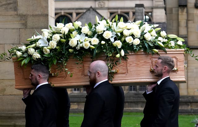 The coffin of Sir Bobby Charlton is carried by pallbearers (Martin Rickett/PA)