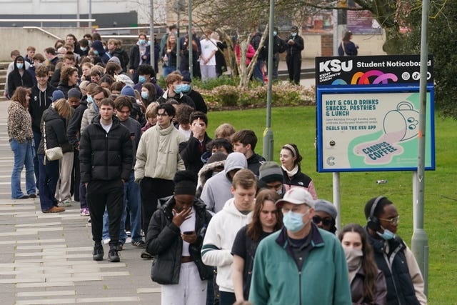 Students queuing for antibiotics outside a building at the University of Kent in Canterbury