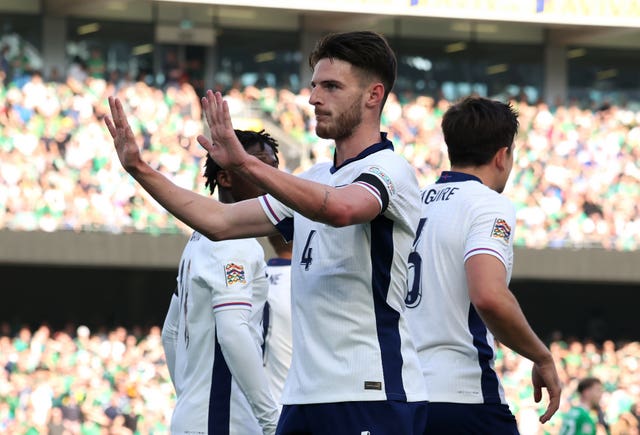 Declan Rice holds up his hands after scoring England''s opener