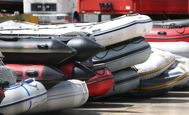 Boats in a secure compound in Dover which have been seized after being intercepted in the Channel