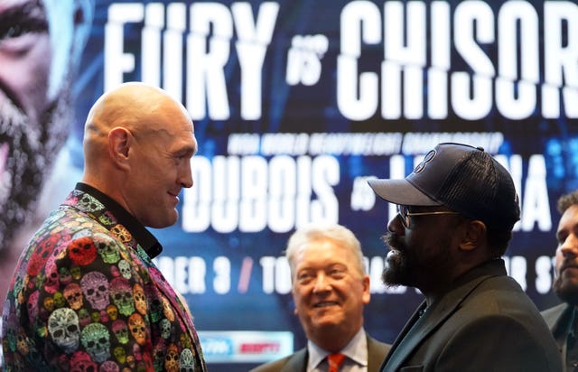 Tyson Fury and Derek Chisora (right) at a press conference on Thursday