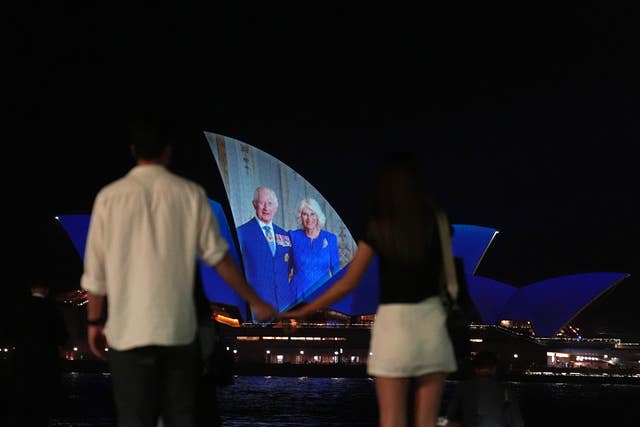 Pictures are projected onto Sydney Opera House after the King and Queen's arrival 