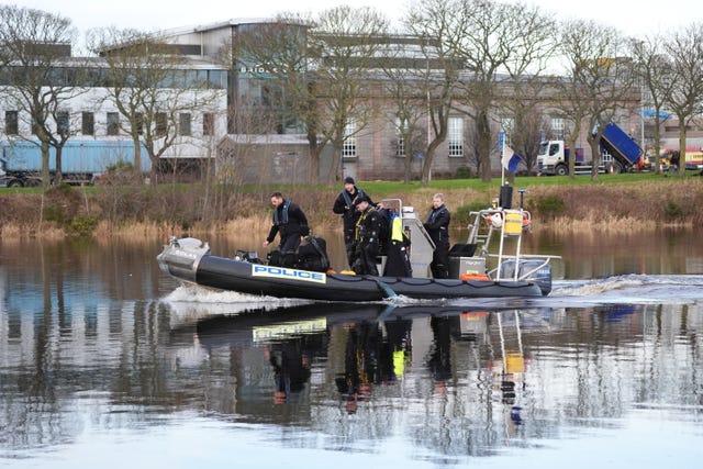 Police dive boat on a river