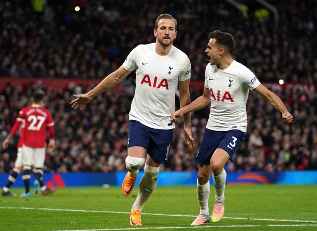 Harry Kane, left, celebrates his equalizer