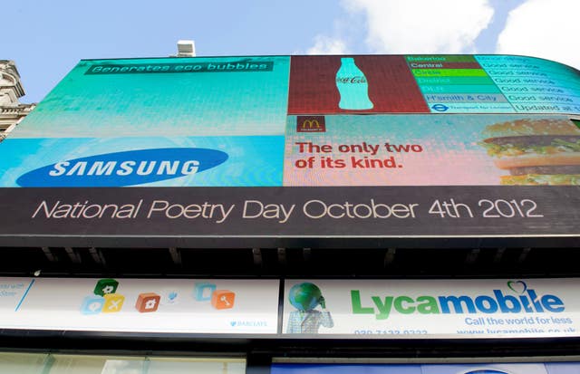 Poetry lights up London landmark Piccadilly Circus (Dominic Lipinski/PA)