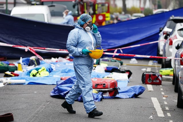 A forensic investigator at the scene (Aaron Chown/PA)