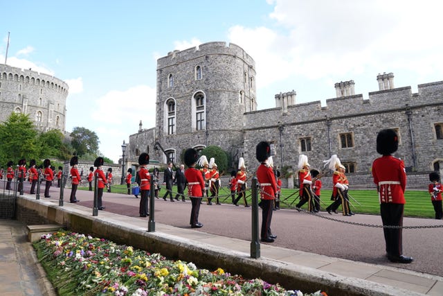 Soldiers from the Grenadier Guards outside St George’s Chapel in Windsor Castle (Kirsty O'Connor/PA)
