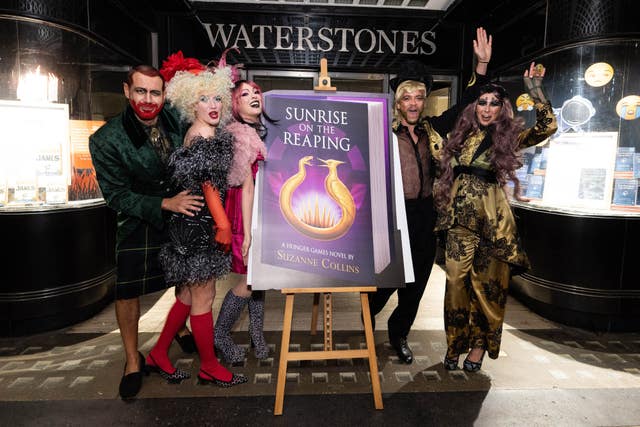 Cosplayers John Diamantes, Sarah Conley, Blayze Collins-Perucchetti, Gareth McLaughlin and Leah Glater at a launch event for the new Hunger Games novel Sunrise On The Reaping by Suzanne Collins