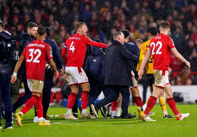 Nottingham Forest manager Steve Cooper attempts to intervene as tempers flare