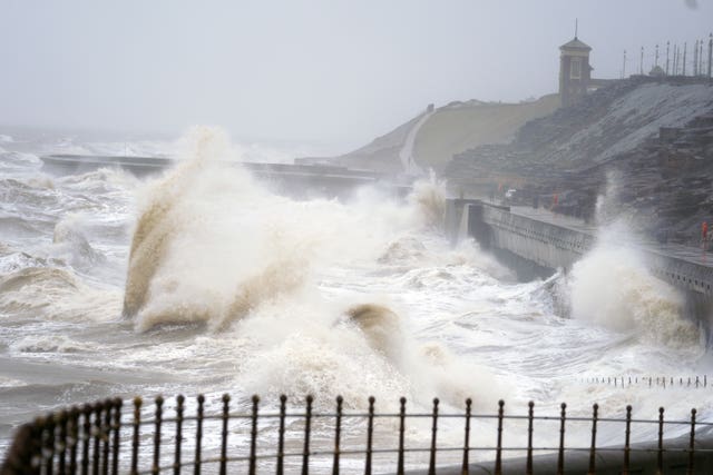 Waves break on the seafront in Blackpool