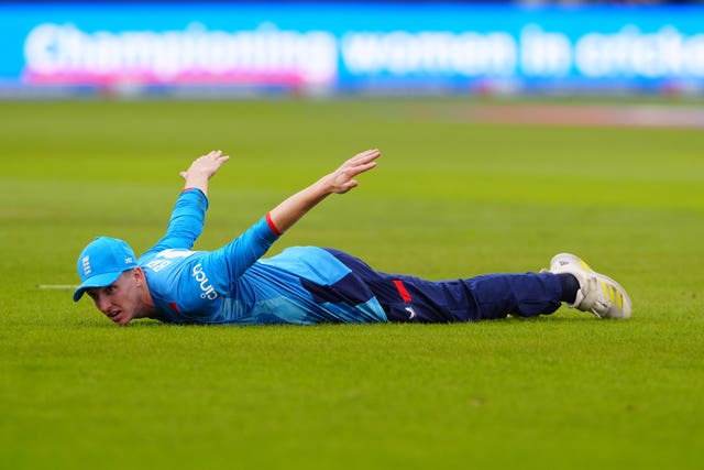 Harry Brooks lays on the floor face down with his arms out having failed to stop a boundary in the third ODI at Durham