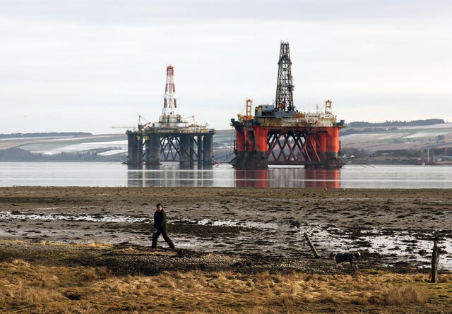 Oil platforms stand amongst other rigs in the Cromarty Firth