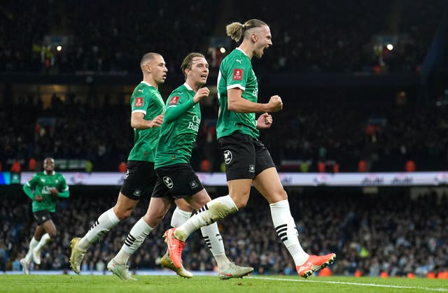 Plymouth Argyle’s Maksym Talovierov celebrates scoring against Manchester City