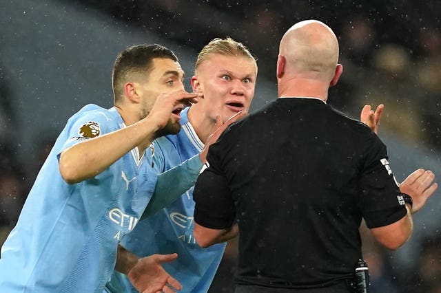 Manchester City have been charged with failing to control their players 
