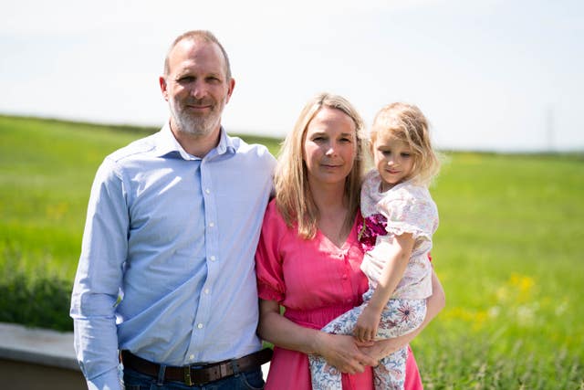 Sarah and Jack Hawkins, with their daughter, Lottie