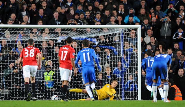 Eden Hazard, second right, scores Chelsea’s crucial third goal