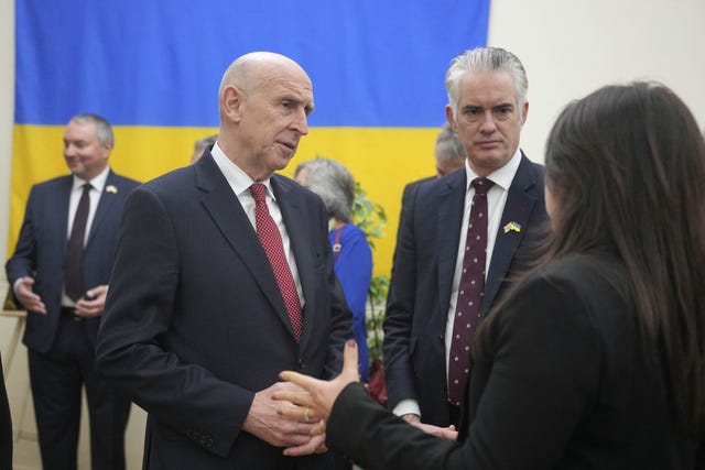 Defence Secretary John Healey and shadow defence secretary James Cartlidge with Ukraine flag 