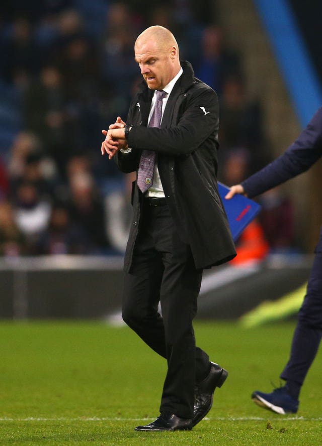 Sean Dyche walks off the field after his Burnley side were thrashed 5-1 at home to Everton 