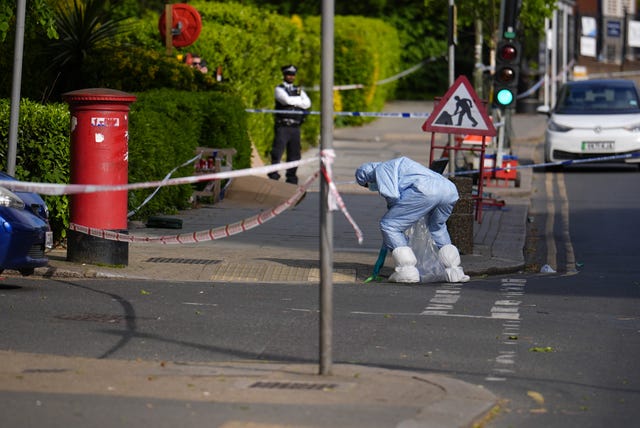 A forensics officer at the scene of the incident in Golders Green
