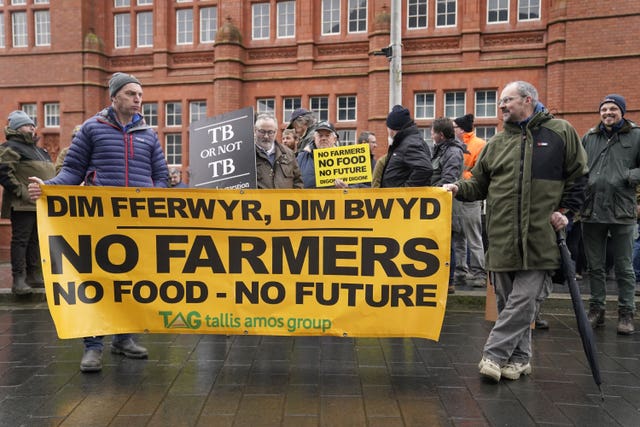 Farmers protest outside the Sennedd in Cardiff (Andrew Matthews/PA)