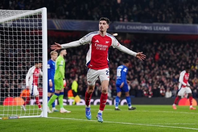 Kai Havertz holds both arms out to celebrate