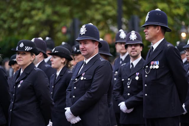 Police officers in fdress uniform (Tim Goode/PA