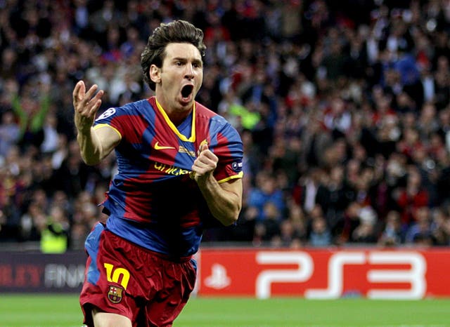 Lionel Messi celebrates scoring for Barcelona