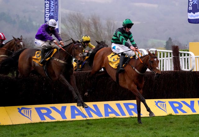 Fugitif jumps the last alongside eventual winner Seddon at the Cheltenham Festival 