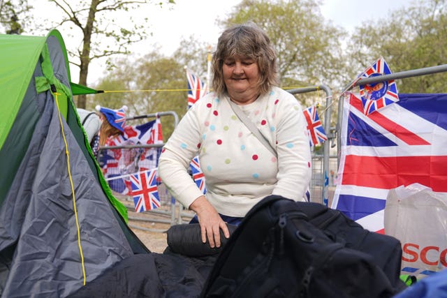 Kim Bilson, from Poole in Dorset, who is already in position along The Mall in central London ahead of the coronation