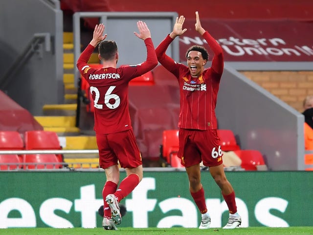 Andy Robertson and Trent Alexander-Arnold celebrate on the pitch