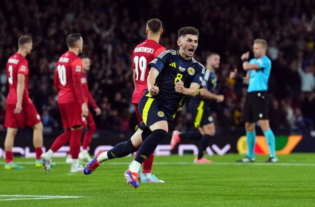 Billy Gilmour runs away celebrating after scoring for Scotland