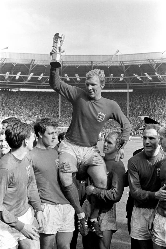 George Cohen (second right) celebrates England's World Cup win with his team-mates as captain Bobby Moore is held aloft