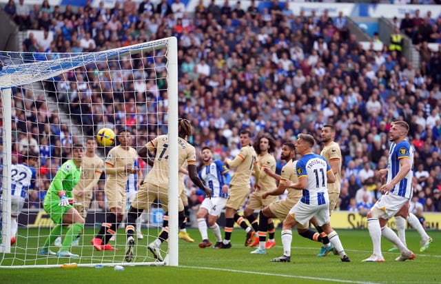Chelsea scored two own goals at the Amex Stadium