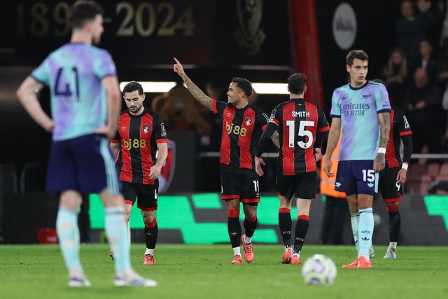 Justin Kluivert, centre, points towards the stand after scoring Bournemouth''s second goal against Arsenal