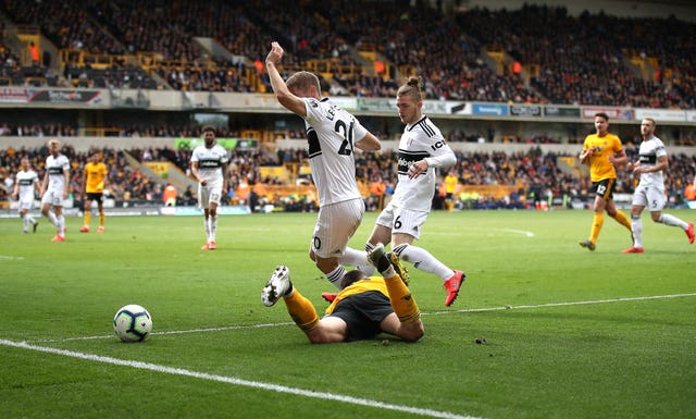 Harvey Elliott (right) was the previous record-holder after playing for Fulham against Wolves 