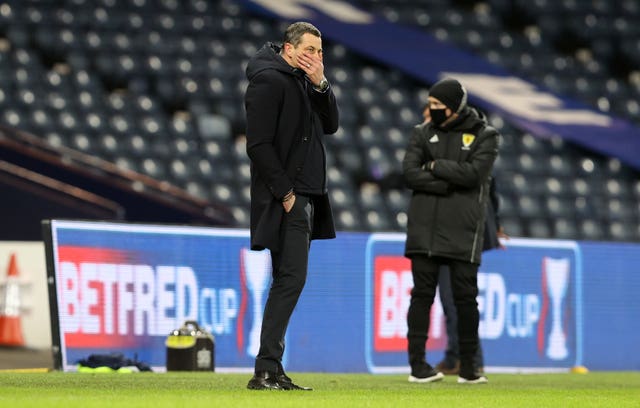 Hibernian manager Jack Ross stands dejected on the touchline as his side slumped against St Johnstone 