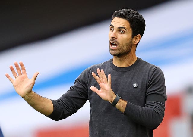 Arsenal manager Mikel Arteta, pictured, has been linked with a move for Willian