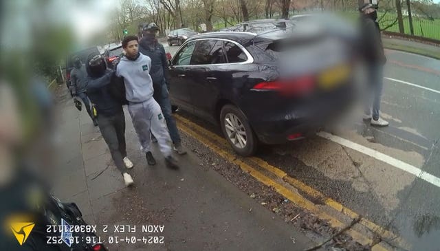 Video grab from a police body worn camera of officers as they arrest Gilson Martins